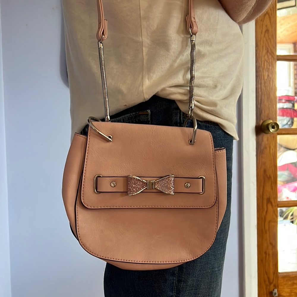 Pastel pink Candie’s bag with bow